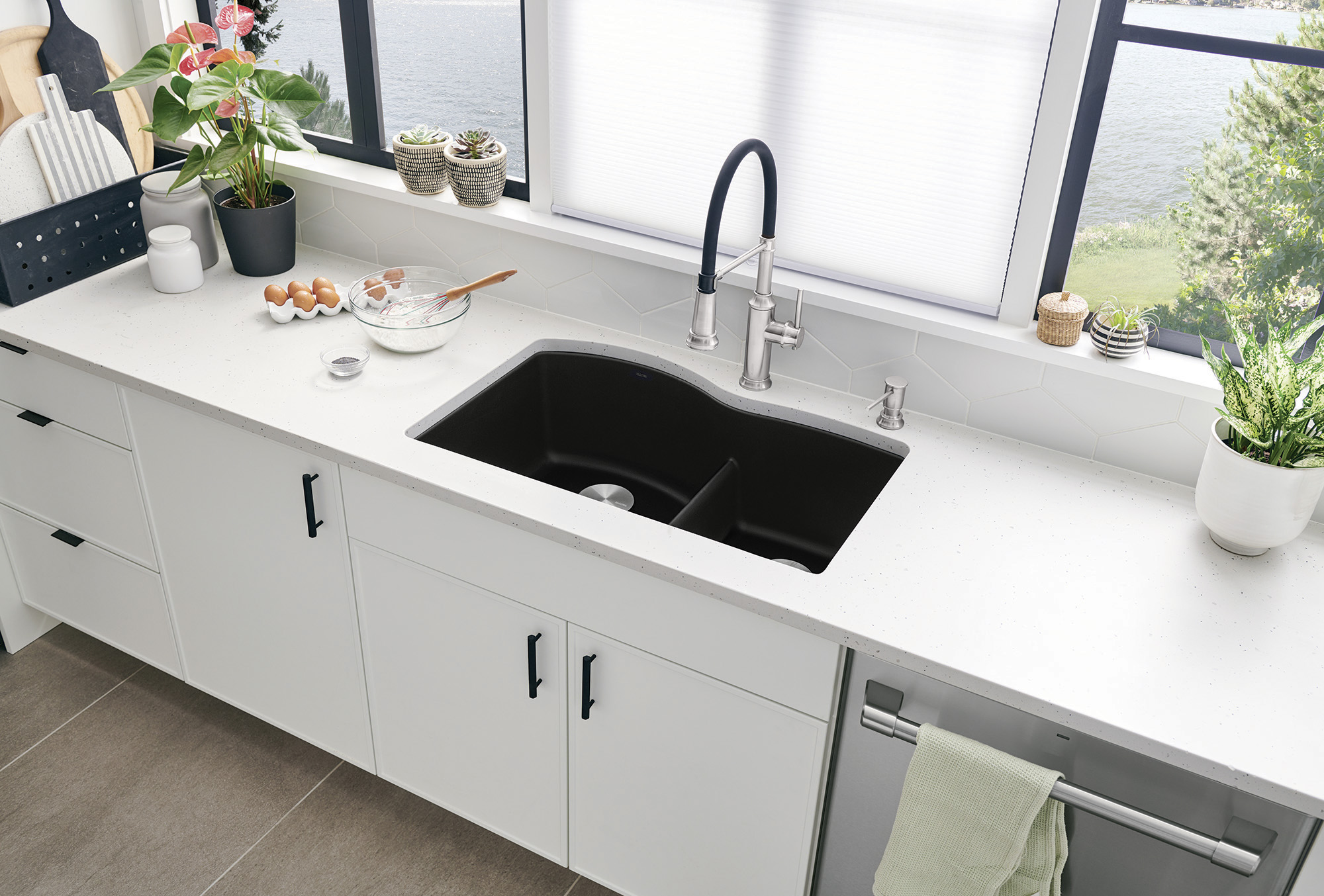 Start with a clean slate by painting the walls white and swapping out dark countertops