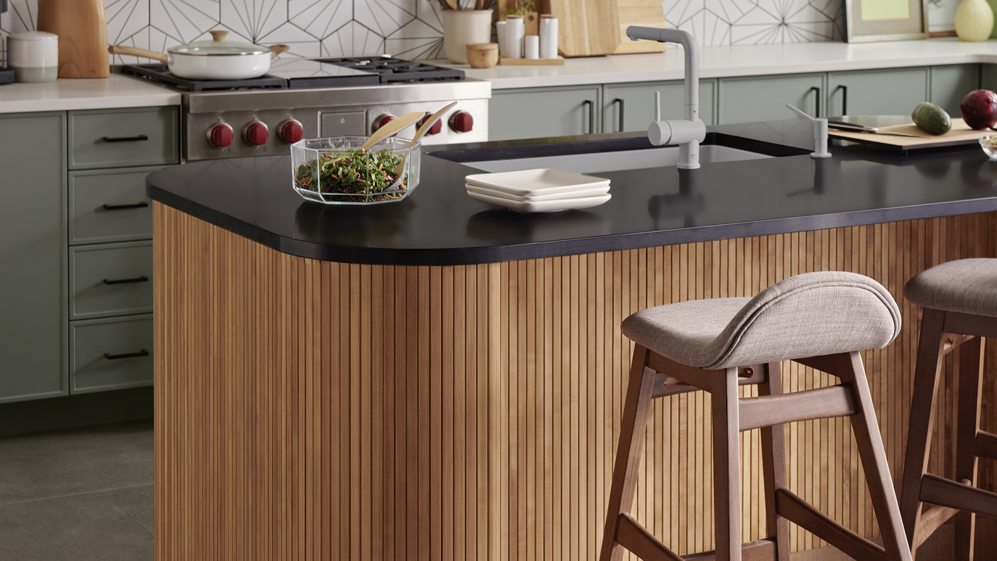 Pair a round or oval mid-century modern kitchen table with geometric chairs.