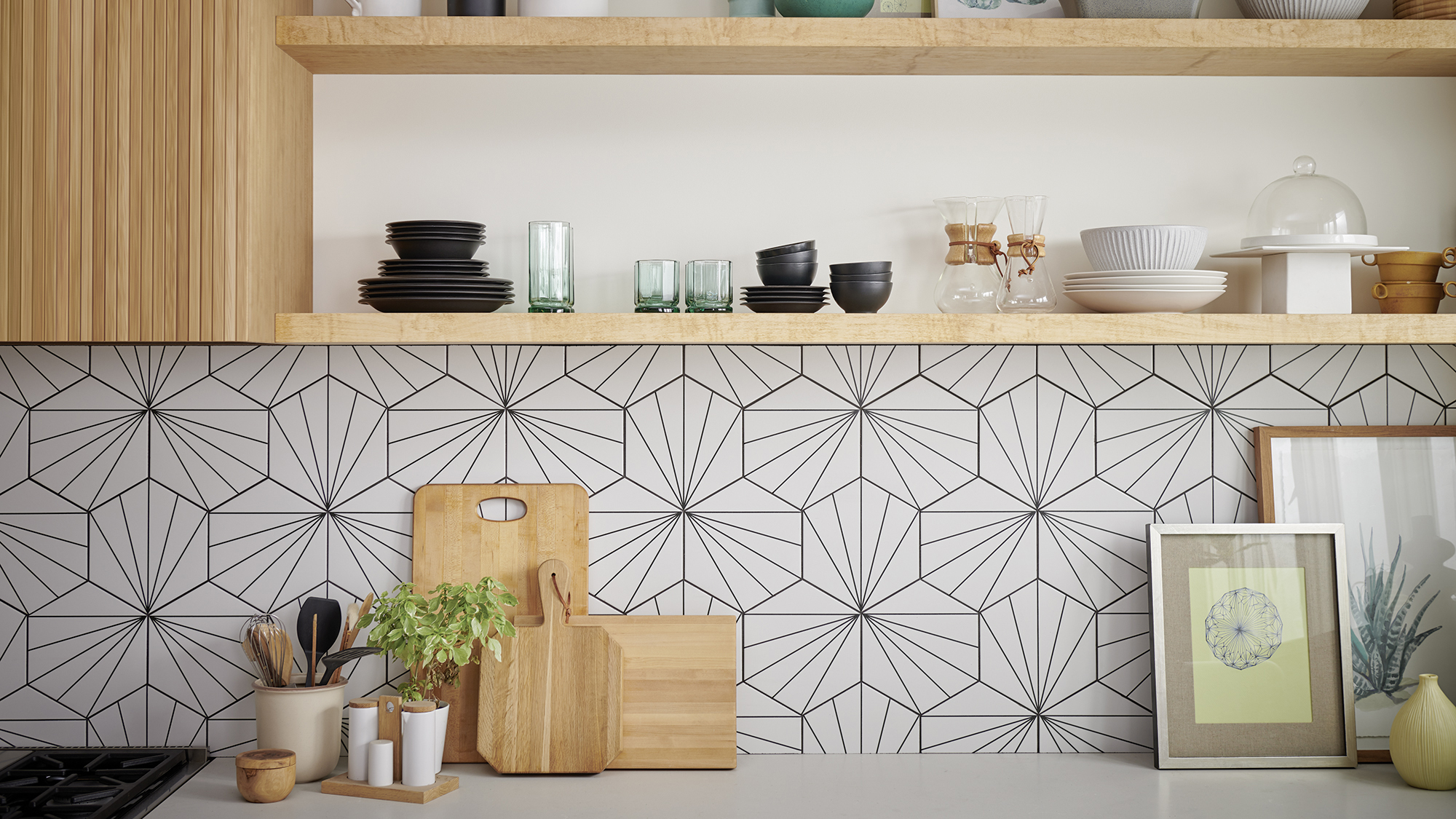 Open shelving often sits alongside mid-century modern kitchen cabinets