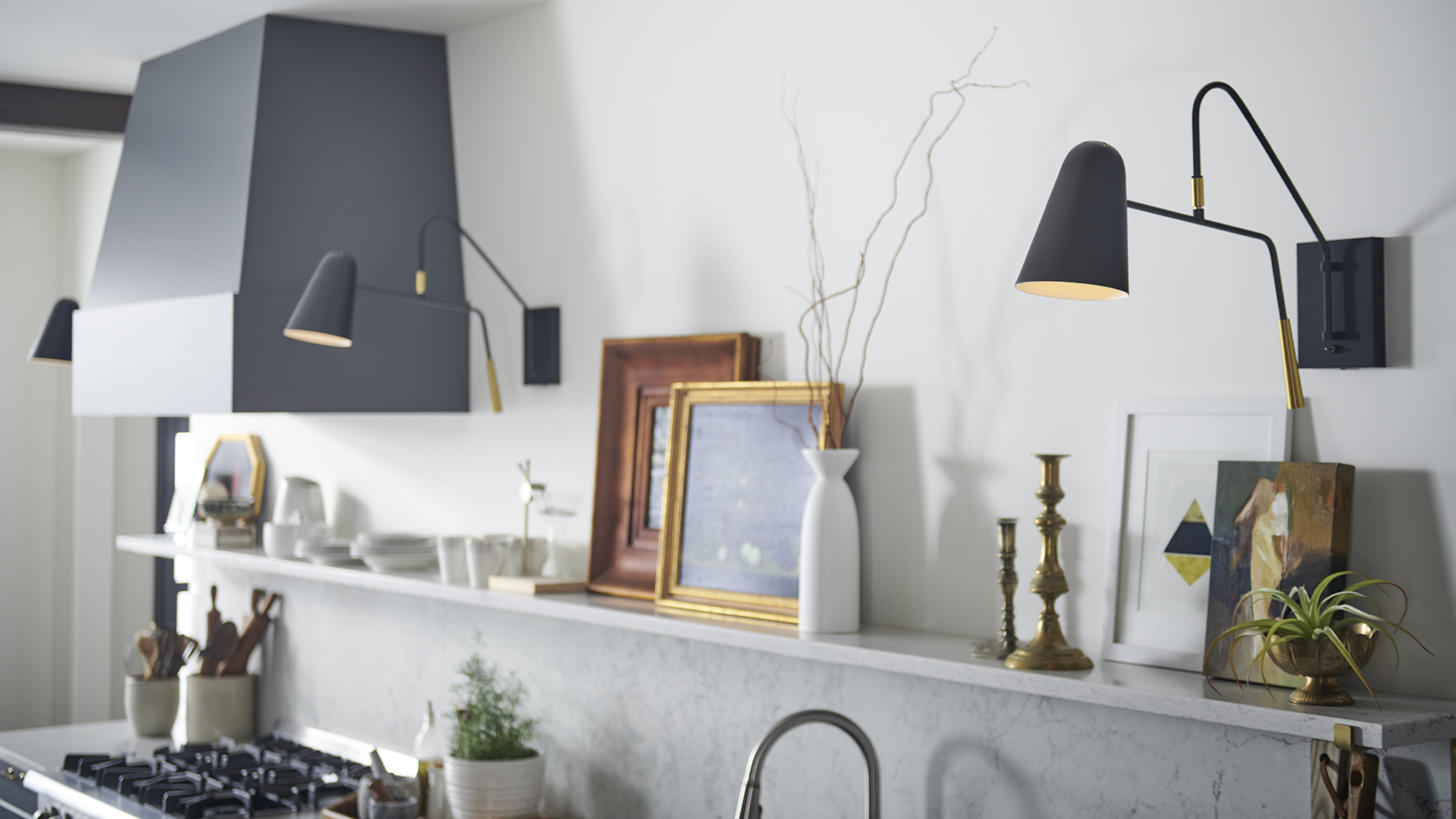 A transitional kitchen includes well-curated heirloom pieces that add texture to the kitchen