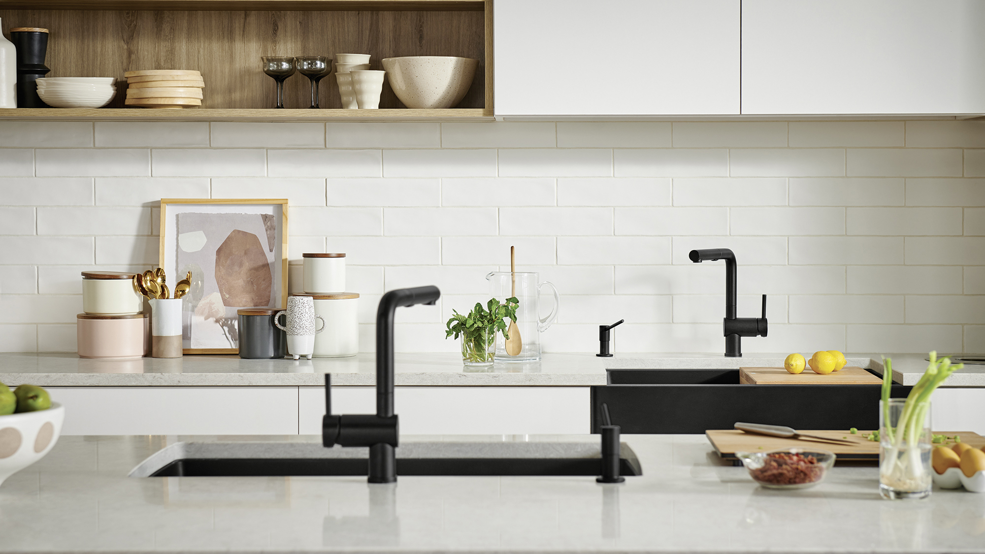 Sink and faucet fixtures in a Scandinavian style kitchen are modern and minimal