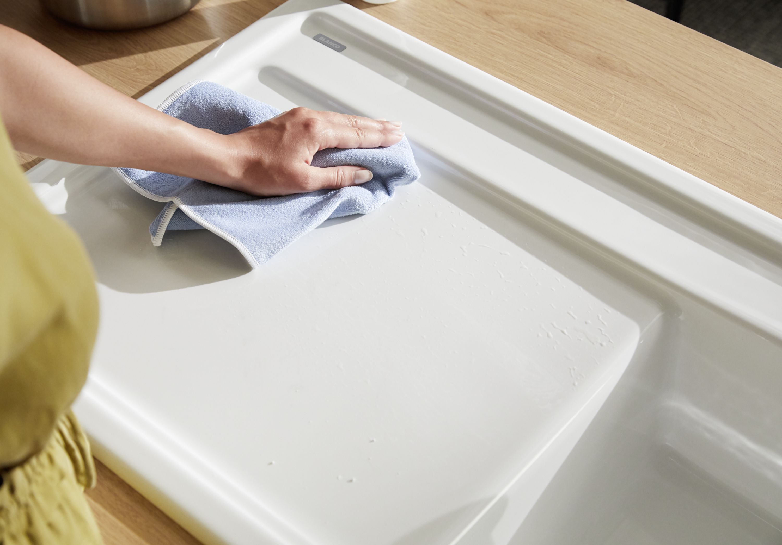 Rub the sink dry with a microfibre cloth so that there are no streaks.