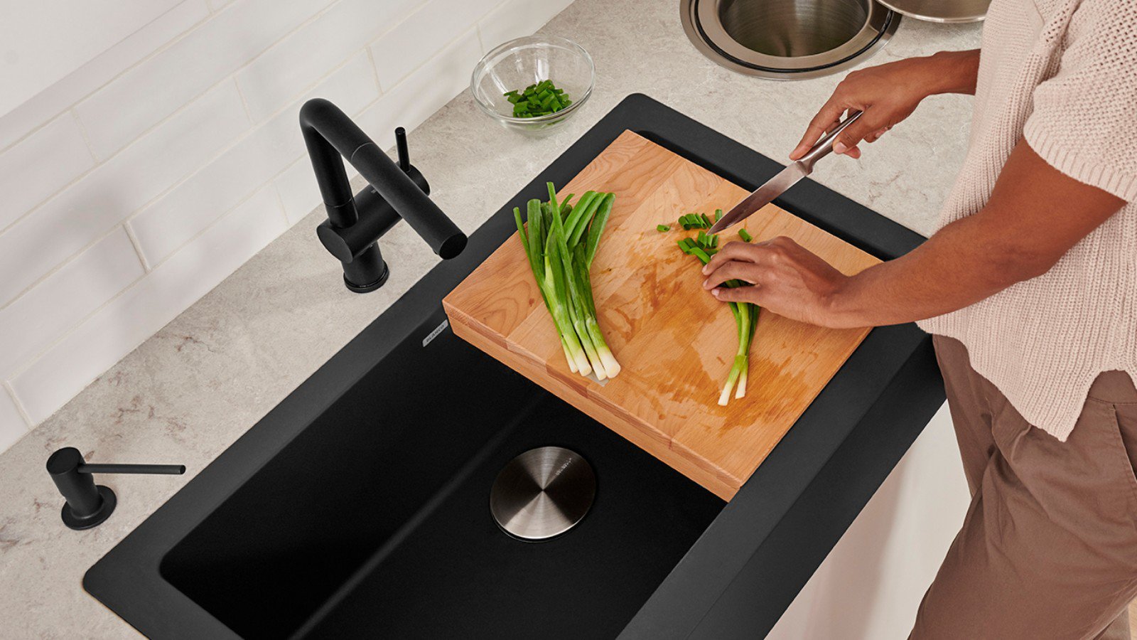 VINTERA Farmhouse Kitchen Sinks can be customized with grids and cutting boards