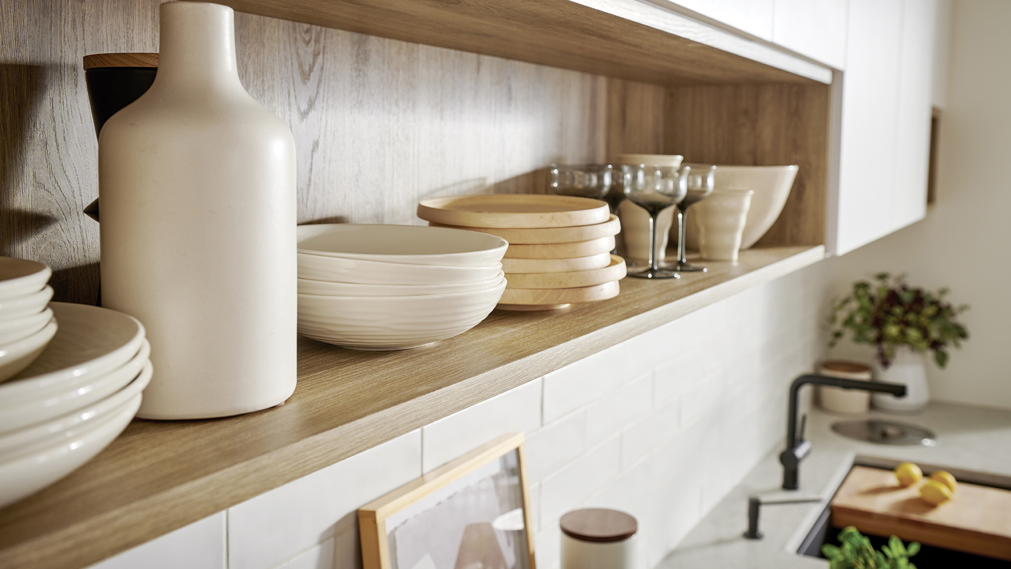 As an alternative to a Scandinavian kitchen cabinet, opt for shelving instead.
