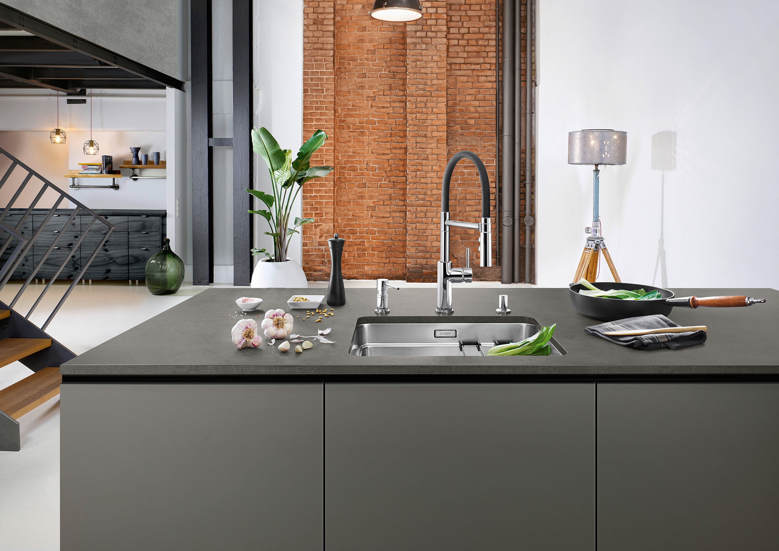 Blanco-Catris Flexo in chrome, with the matching Lato soap dispenser and chrome pop-up