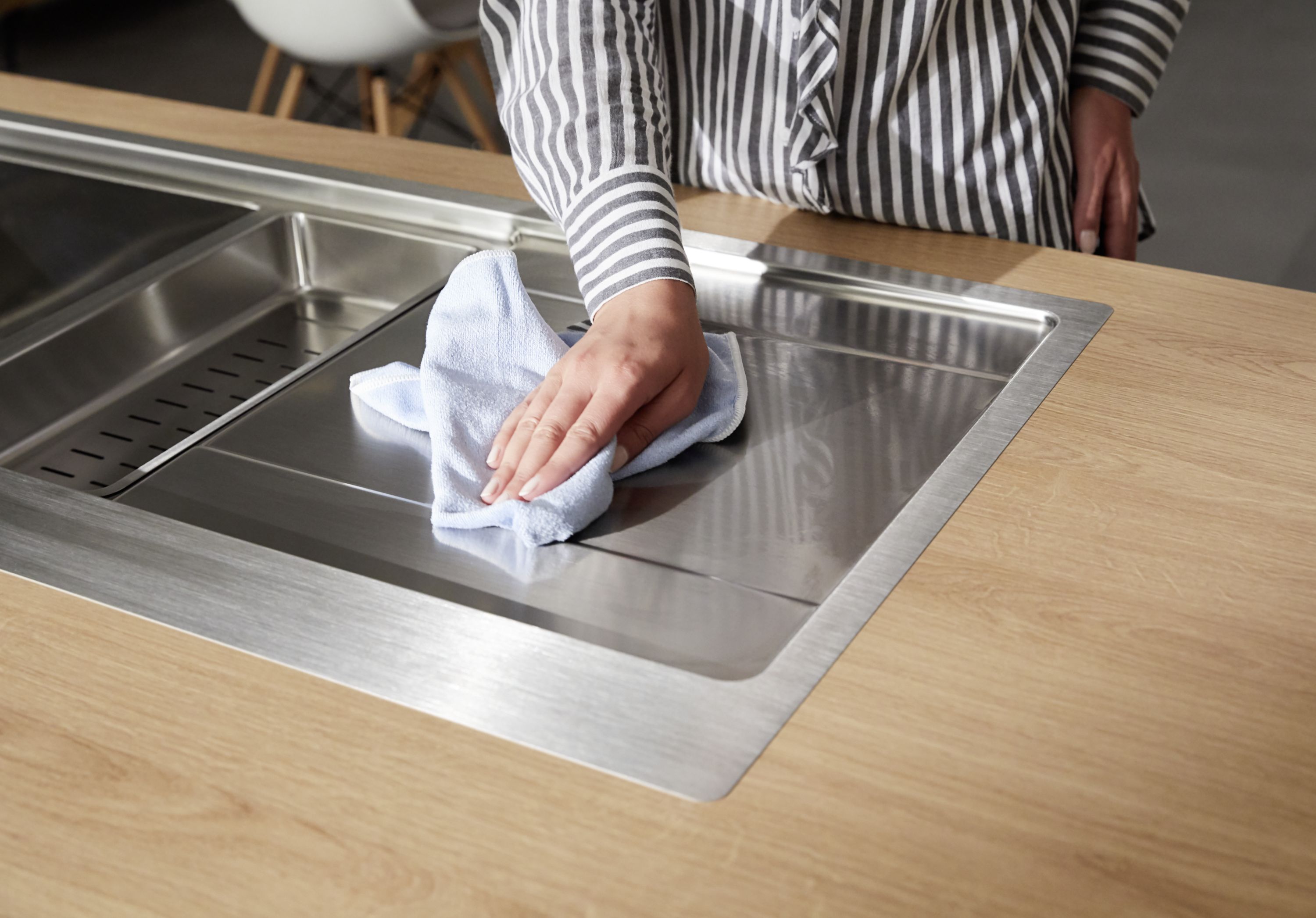 BLANCO stainless steel sink is dried with a microfibre cloth 