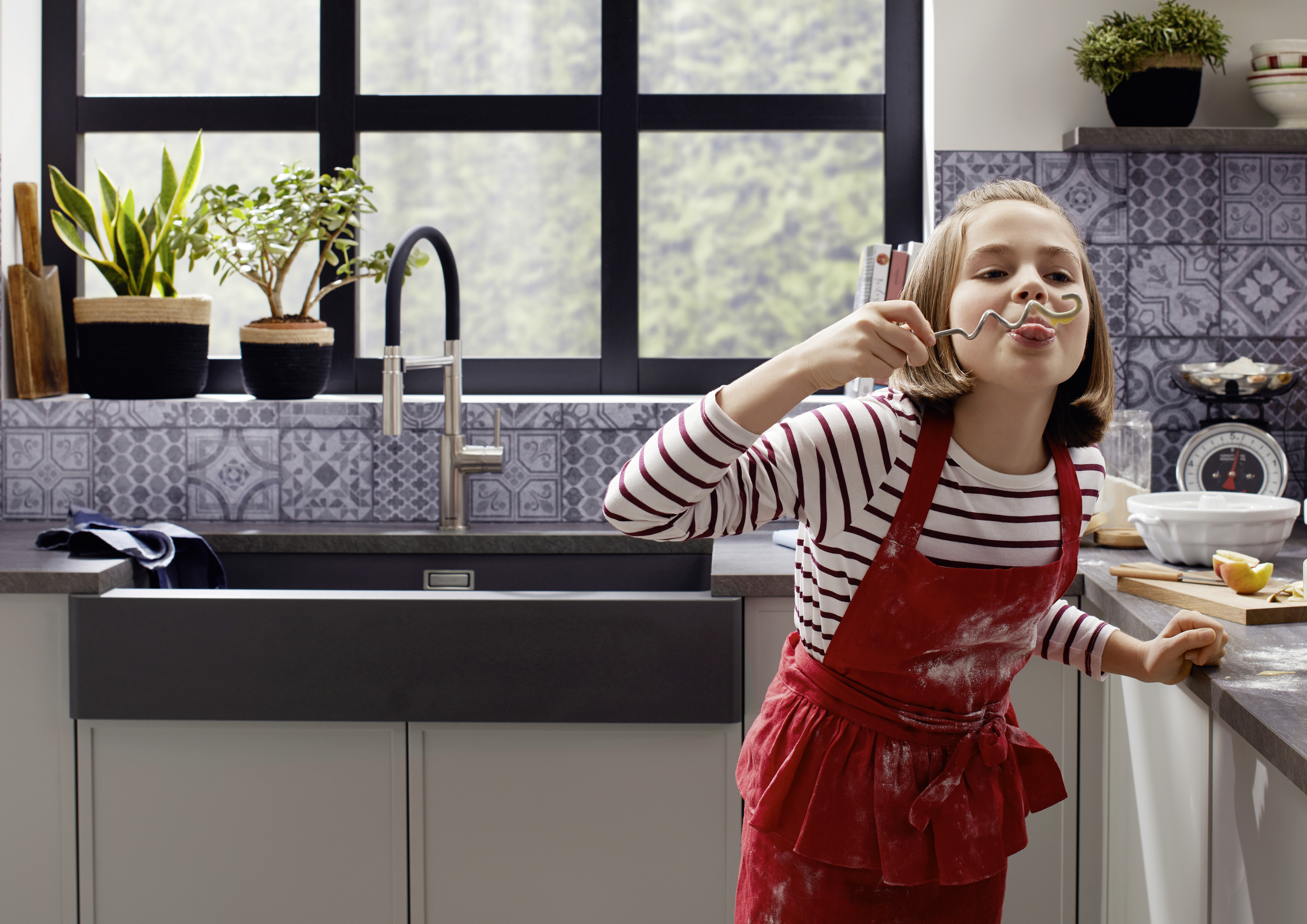 Stainless steel farmhouse-style sink meets history