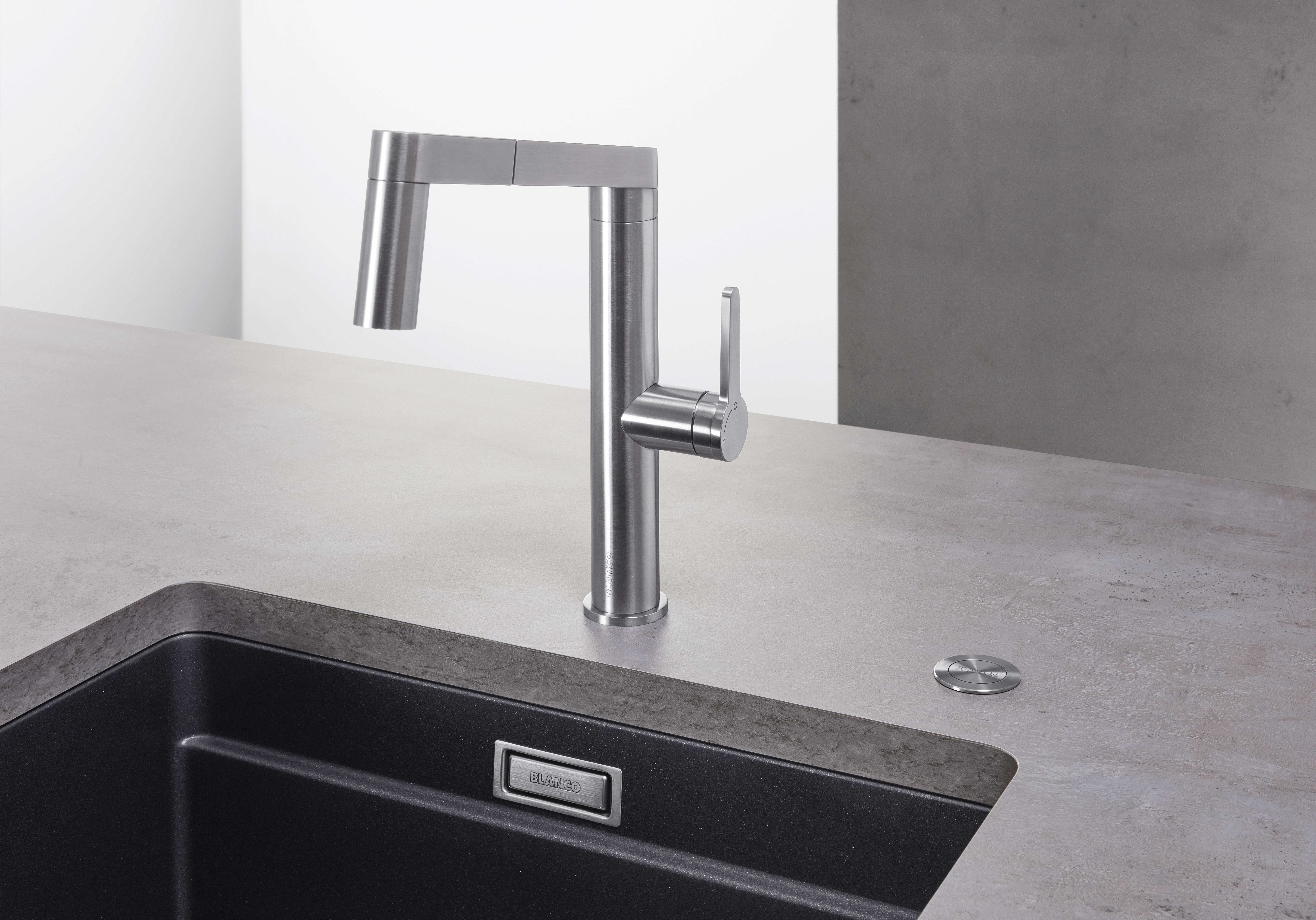 Elegante spoeltafelaccessoires – BLANCO afloopbediening met drukknop