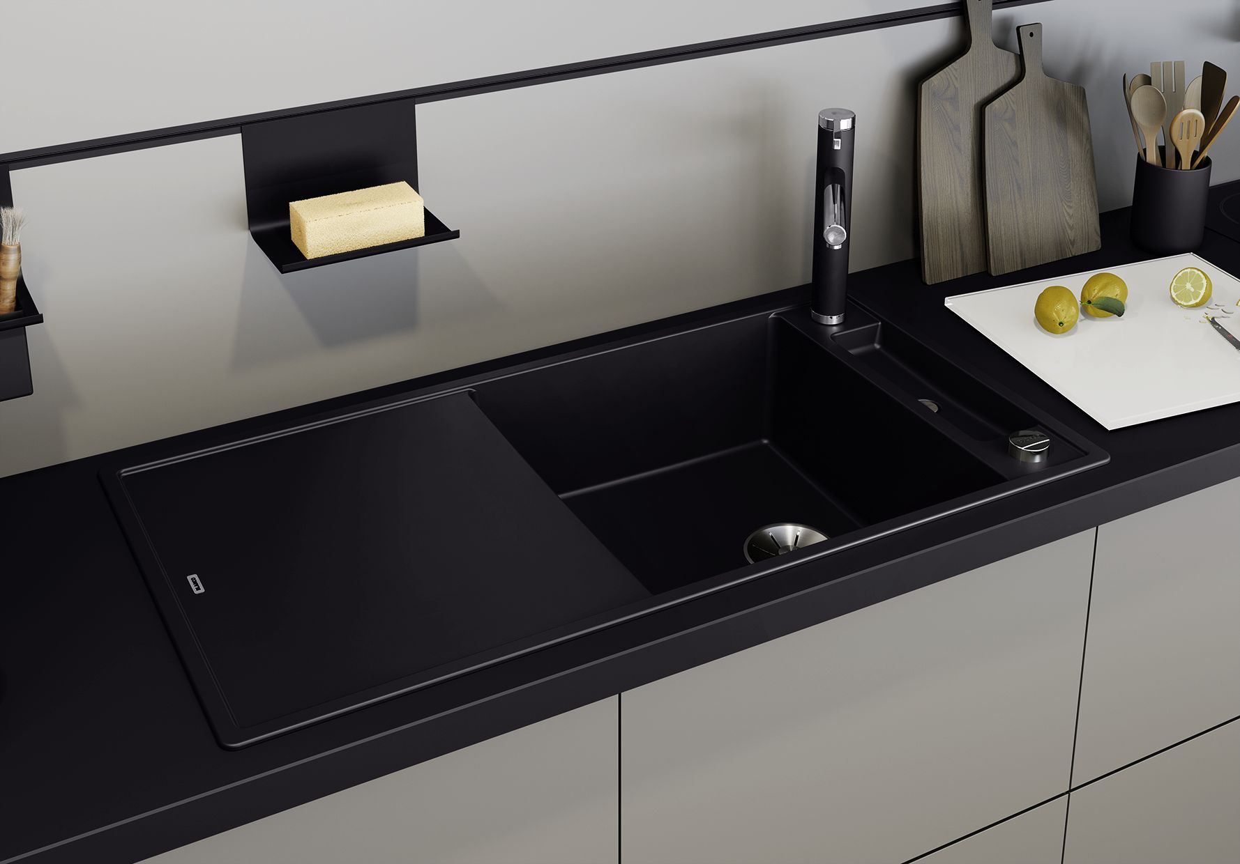 Mixer taps and sinks in the new SILGRANIT® PuraDur® black nestle perfectly into dark worktops.
